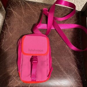 LULULEMON ZIP TOP ADJUSTABLE STRAP CROSSBODY BAG PINK AND ORAGE
